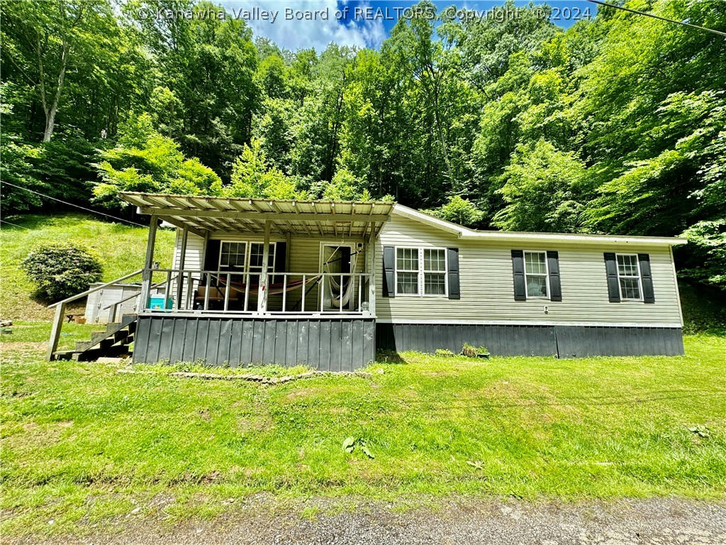 1358 MIDDLE HORSE CREEK RD, JULIAN, WV 25529, photo 1 of 24