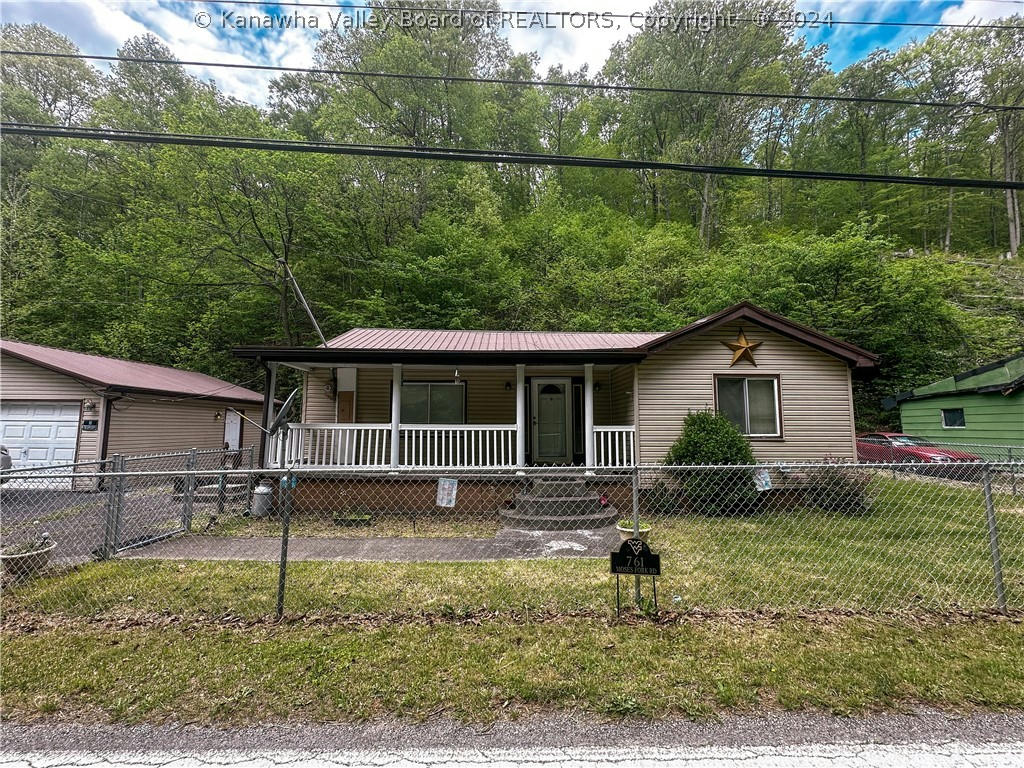 761 MOSES FRK, DINGESS, WV 25671, photo 1 of 16
